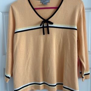 Peach Knit Sweater with Black Trim and Bow